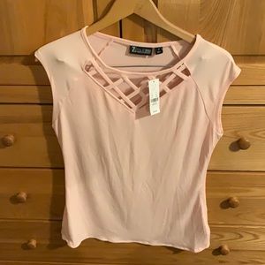 Cap sleeve t-shirt with cross-cross detail.